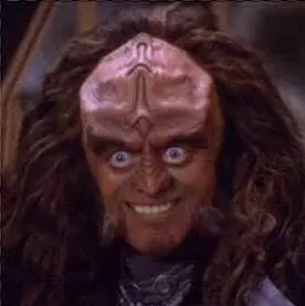 Gowron gives his customary charming smile and jolly eyes.