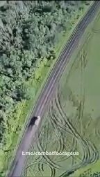 Perfect grenade drop on a moving enemy vehicle by a Ukrainian drone operator.