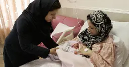 Iran is urging people to have babies — and making life hard for those who don't want to