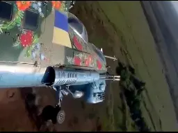 A beautifully decorated Ukrainian Mi-24P helicopter fires Hydra-70 rockets at Russian positions.