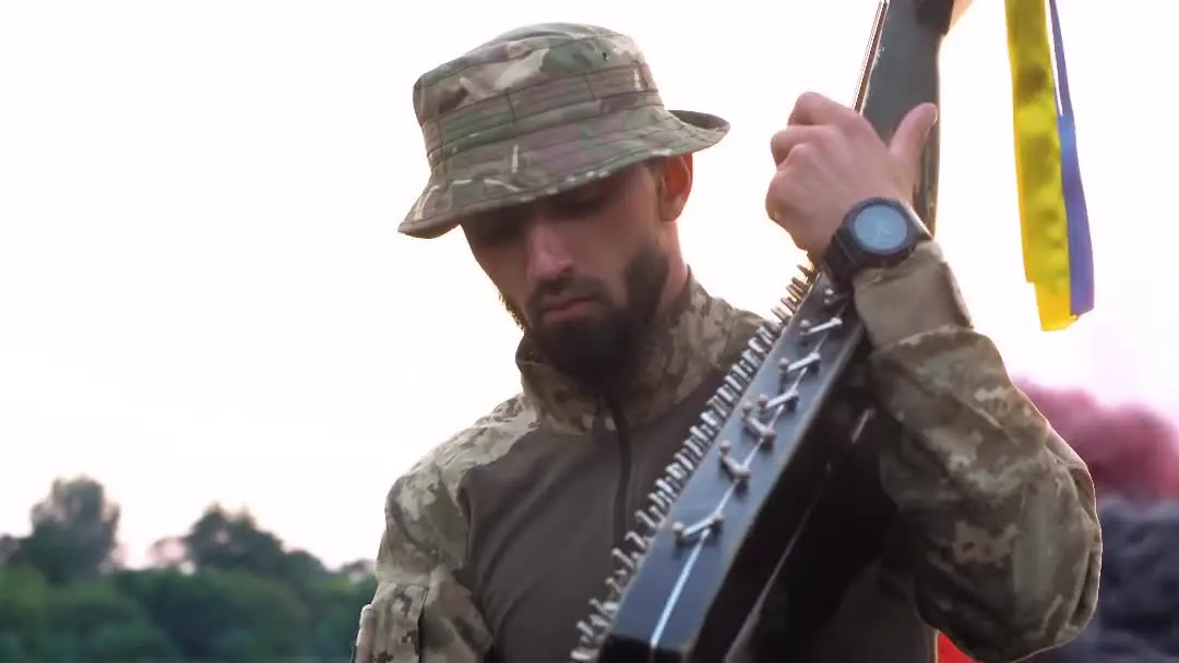 A soldier of the Armed Forces of Ukraine, Dmytro Romanchuk, plays "Elegy" on the bandura.