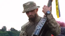 A soldier of the Armed Forces of Ukraine, Dmytro Romanchuk, plays "Elegy" on the bandura.